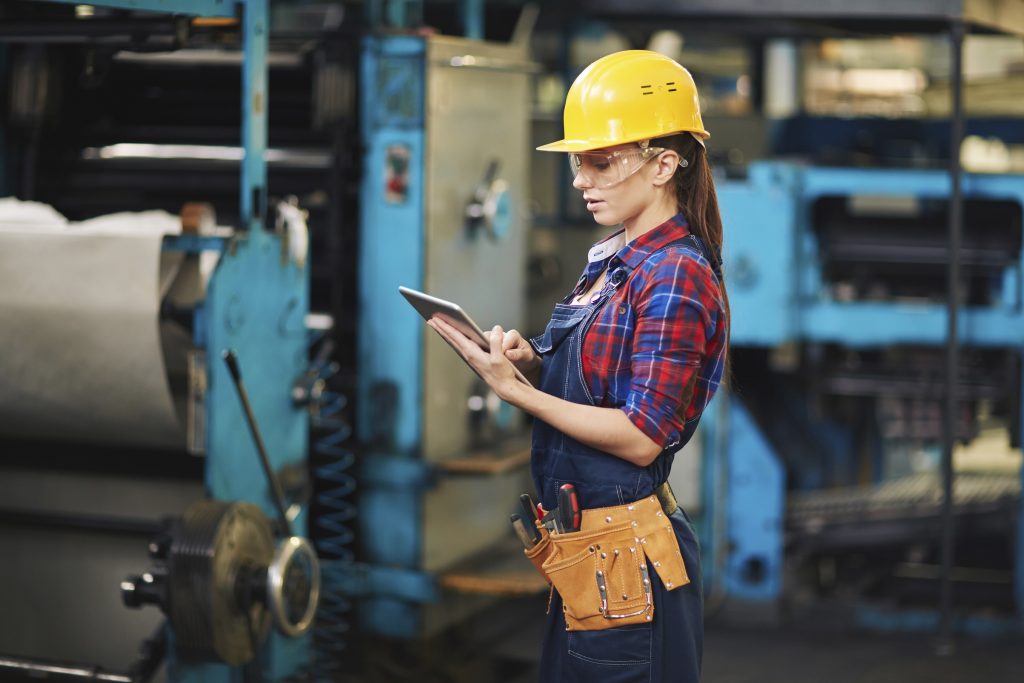 Woman Factory Worker with iPad scaled